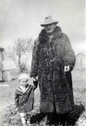 Peter Wiley with child (Dunlay step-grandson?)