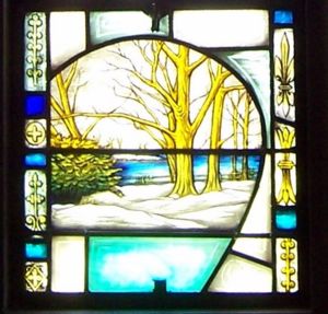 Stained glass church window depicting land Elizabeth owned