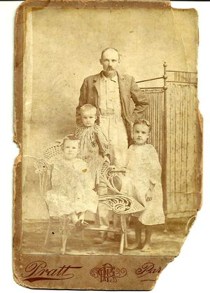 Milton Freeman and his daughters,  Lucy, Caroline, and Addie