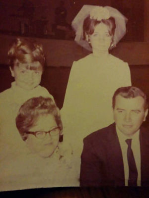 Flora Mae Kakos and Richard Phillips and their daughters