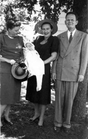 Leroy Rudd with wife and child