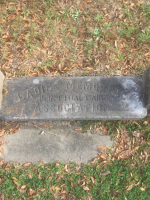 Ladies Memorial Perpetual Care Association at entrance to small grouping of Civil War gravestones