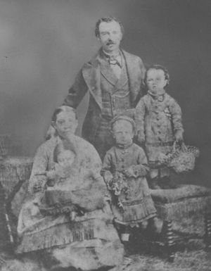 Walter & Elizabeth Barnett with Baby Isabella, Rachel, Harriet (on stool)