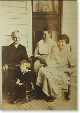 Emma Victoria Winkler and daughter Myra P Shearer,  her children Elizabeth Rose Betty Buck, Richard William Buck. Lady in white apron unknown