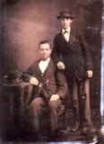 Menzo Davis Huxley standing with his brother Harry E. Huxley