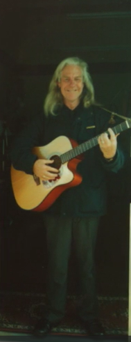 Peter McCutcheon playing guitar