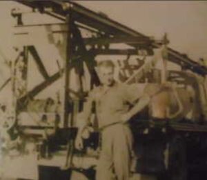 Grandpa Floyd with his well drilling truck 