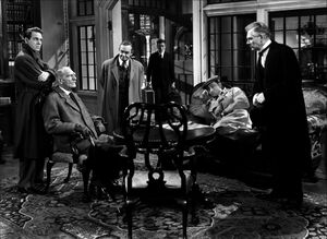 Louis Hayward, C. Aubrey Smith, Barry Fitzgerald, Richard Haydn, Mischa Auer, and Walter Huston in And Then There Were None