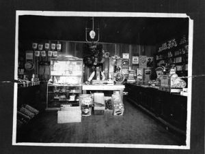 Bragg in his grocery store in 1911 in Oak Park area of Sacramento, CA