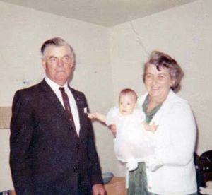 Sigurd and Ruth Thomsen with grandchild