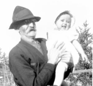 Thomas Waller holding his granddaughter, Patsy Kimball