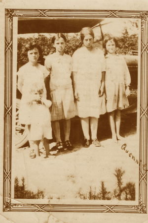 Quinnie as a child with family members and friends.