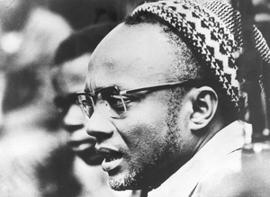Amilcar Cabral, wearing the sumbia - traditional skullcap [presumably during the Cassacá Congress, freed from the southern region of Guinea]
