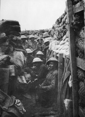 Men of the 53rd Battalion waiting to don their equipment for the attack at Fromelles. Only three of the men shown here came out of the action alive, and those three were wounded.