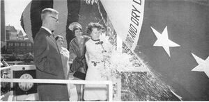 Mrs. Robert McNamara christens the Thomas Jefferson (SSBN-618) as William E. Blewett, Jr,, president of Newport News Shipbuilding and Dry Dock Company stands behind her on 24 February 1962.	