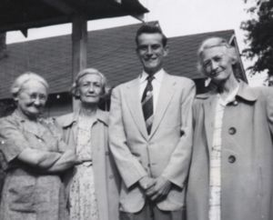The Three Unmarried Brimer Sisters with Their Nephew, Franklin Conn (left to right: Minnie, Lellie, Franklin and Jennie)