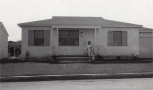 Orvis and Mary's house where they raised their 3 children when young at 3013 Doolittle Ave, Arcadia, CA. Mary's sister Cathelyn is in front with her own son. Abt. 1948