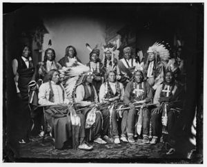 Seated, L to R: Yellow Bear, Chief Red Cloud, Big Road, Little Wound, Black Crow; Standing, L to R: Red Bear, Young Man Afraid of his Horse, Good Voice, Ring Thunder, Iron Crow, White Tail, Young Spotted Tail,  1860-1880
