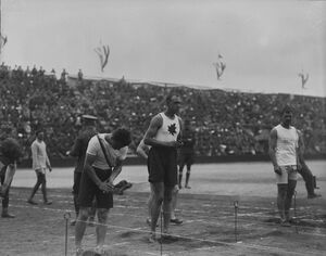 (Track & Field) Howard, Canada, in 4th Heat of 100 M. Dash. Inter-Allied Games, Pershing Stadium, Paris, July 1919. 