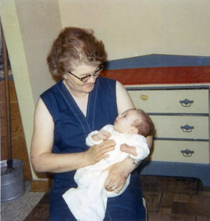 Mary Quast holding granddaughter